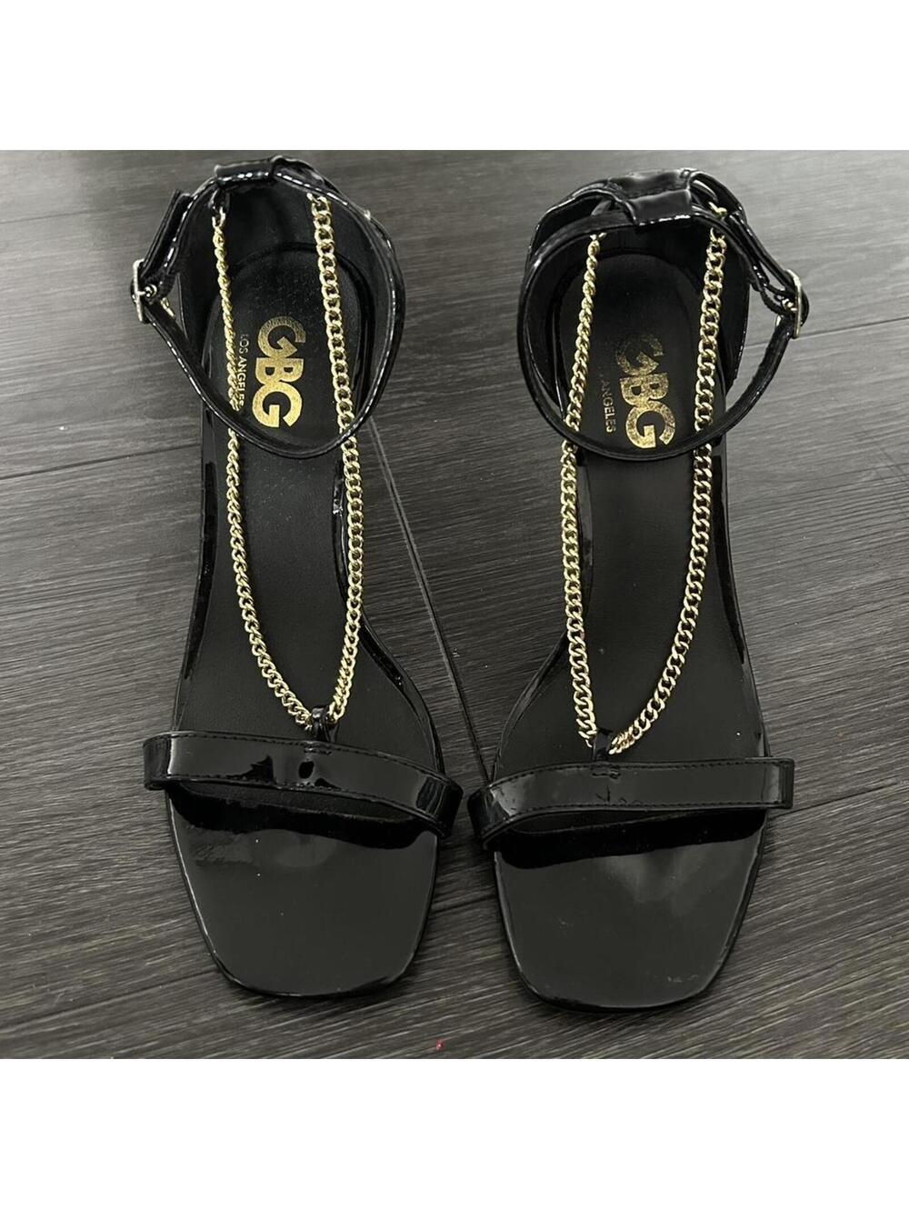 BCBG black patent leather heels with gold chain detail